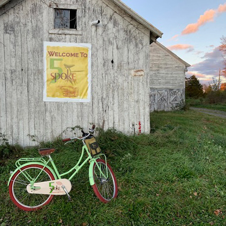 5 Spoke Creamery's bike in front of their barn